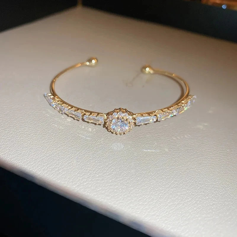 Bamboo Bracelet - Gold-color plated bangle with a sleek geometric design, made from high-quality zinc alloy. Perfect for fashion-forward women.