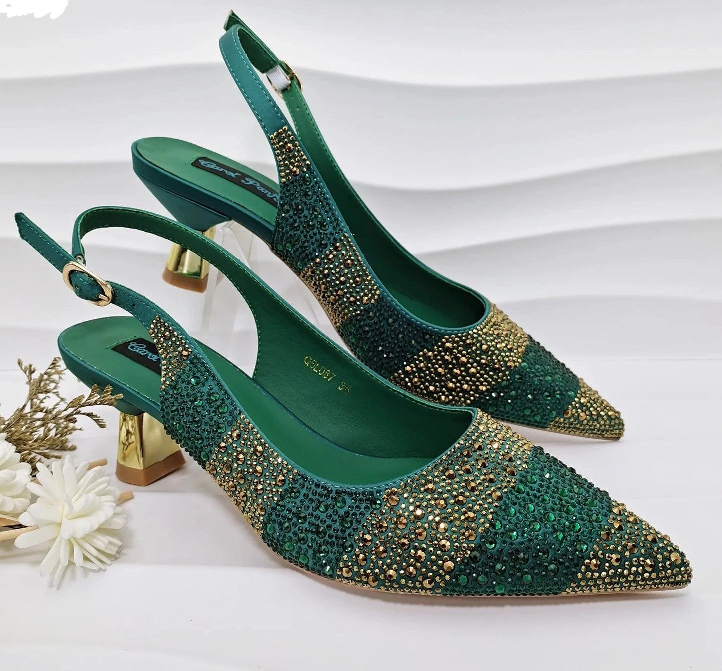 Image of Fashion Forward Strange Style Slingback Pumps in green color, featuring a pointed toe, super high strange style heel, and crystal embellishments. Perfect for parties and special occasions.