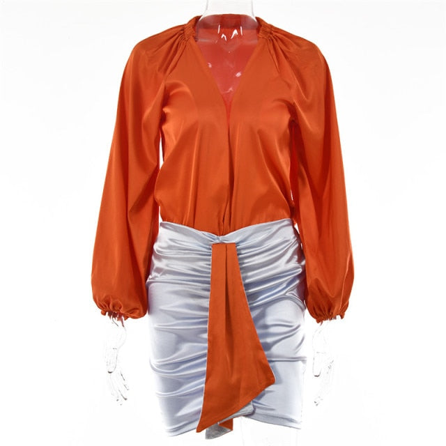 Fall party dress with a V-neck collar and above-the-knee length. This dress is perfect for holiday gatherings, with an elastic waist and regular sleeves for comfort. Available in a range of colors and sizes, so you can find the perfect fit. Don't miss out - order now while supplies last!