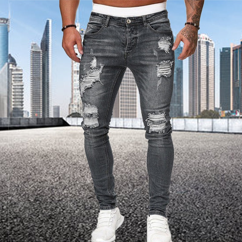 Men's Fashion Street Style Ripped Skinny Jeans with stonewashed and distressed details. Perfect for spring and autumn street style.