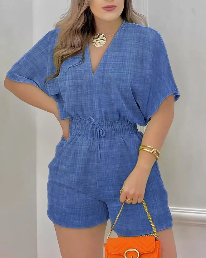 Summer Batwing Sleeve Jumpsuit in POLYESTER broadcloth, featuring a high street design, mid-waist, and pencil pants pattern. Loose fit with shirred decoration. Ideal summer fashion for women.