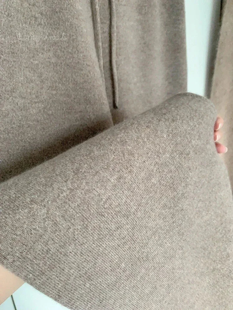 Women’s High-Waisted Loose Wool Wide-Leg Trousers featuring a high waist, button fly closure, and full-length, perfect for autumn and winter office wear.