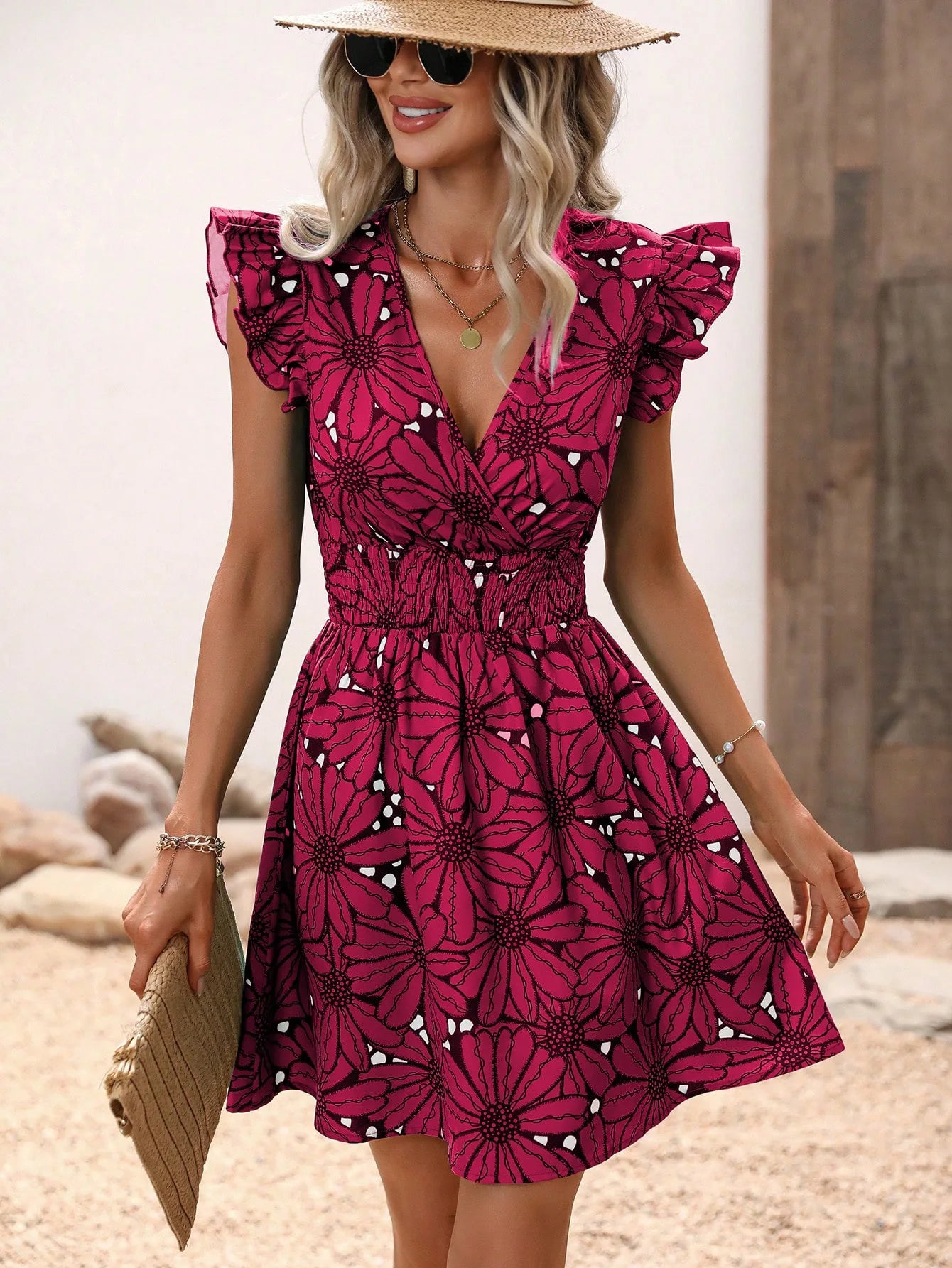 Bohemian floral V-neck mini dress with short sleeves and elastic waist, perfect for spring and summer wear.

