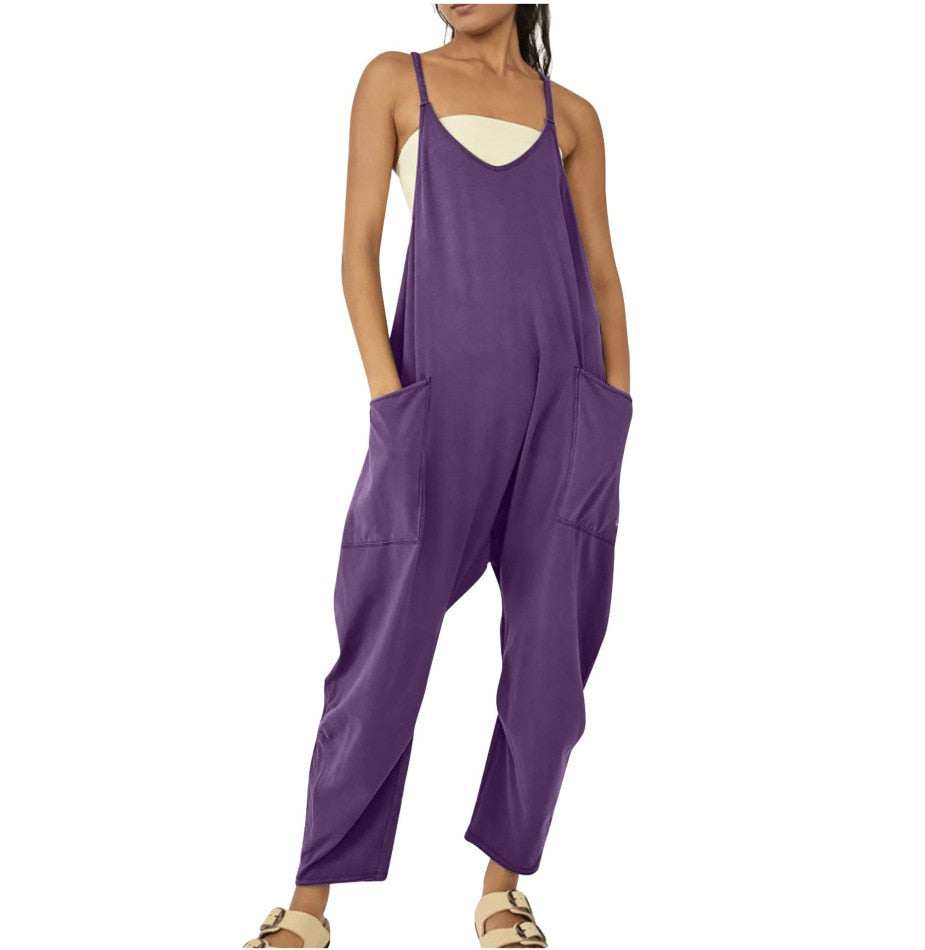 Women's Wide Leg Jumpsuit in solid patterns, loose fit, with pockets. Perfect for summer fashion. Available for women aged 18-24. Made from premium polyester fabric.