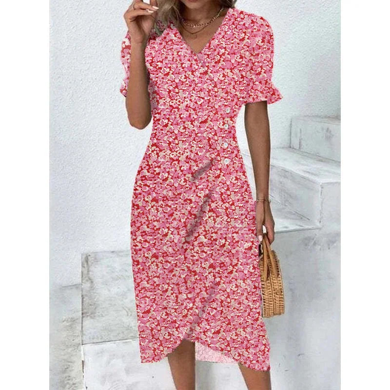 Woman wearing an elegant floral pleated V-neck midi dress with puff sleeves and button details – perfect summer outfit.