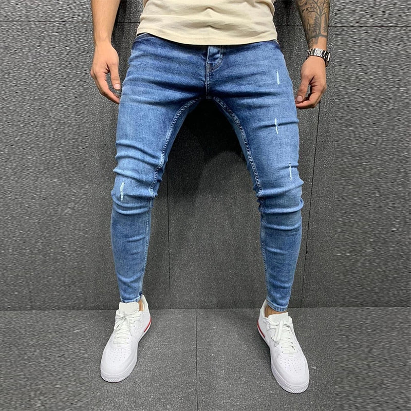 Men's Fashion Street Style Ripped Skinny Jeans with stonewashed and distressed details. Perfect for spring and autumn street style.