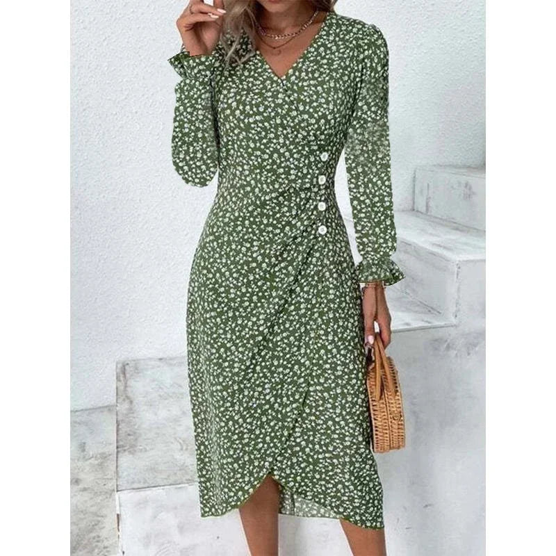 Woman wearing an elegant floral pleated V-neck midi dress with puff sleeves and button details – perfect summer outfit.