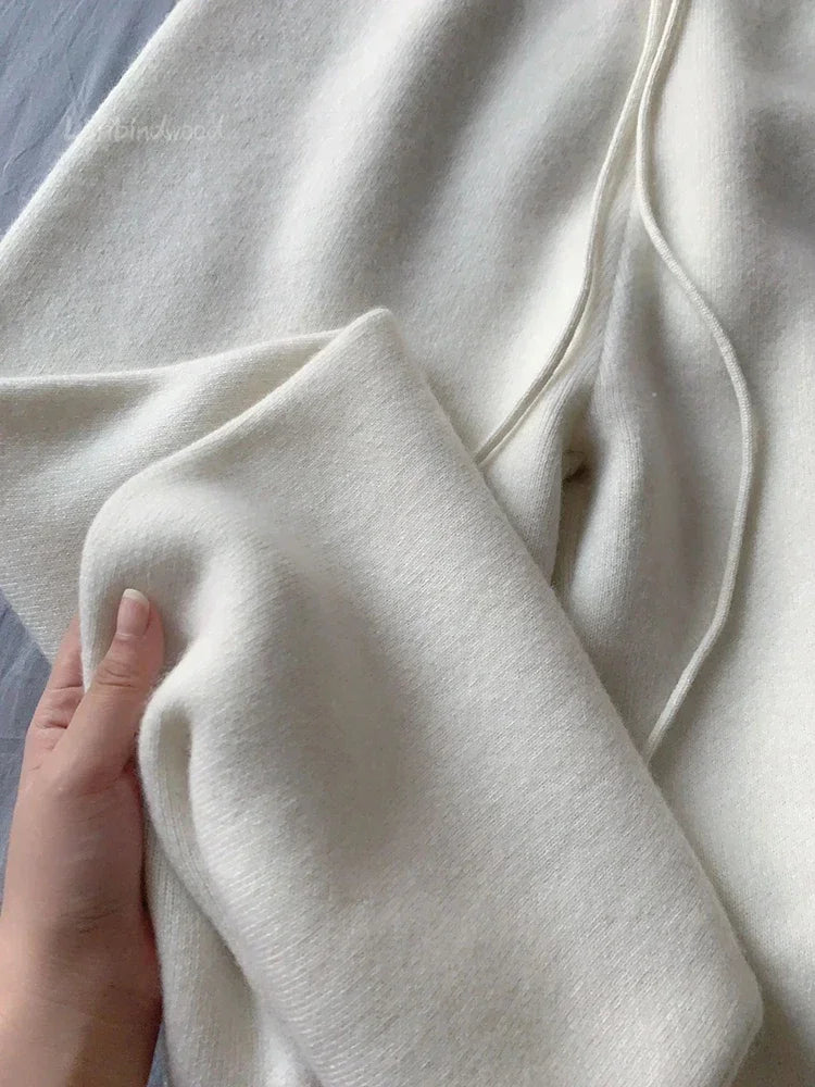 Women’s High-Waisted Loose Wool Wide-Leg Trousers featuring a high waist, button fly closure, and full-length, perfect for autumn and winter office wear.