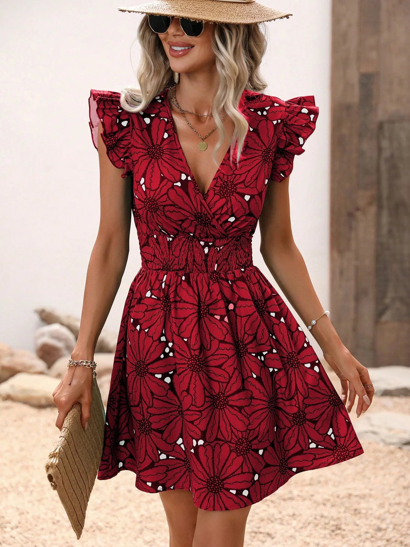 Bohemian floral V-neck mini dress with short sleeves and elastic waist, perfect for spring and summer wear.

