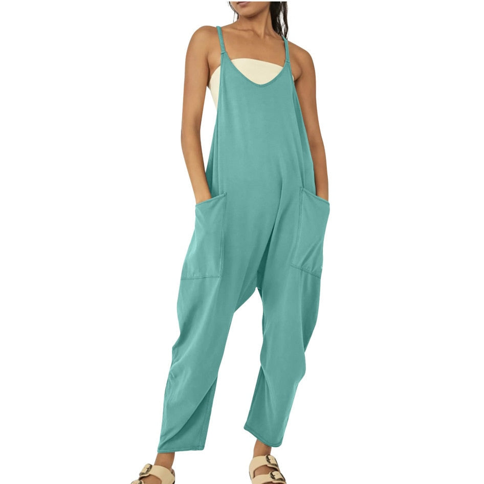 Women's Wide Leg Jumpsuit in solid patterns, loose fit, with pockets. Perfect for summer fashion. Available for women aged 18-24. Made from premium polyester fabric.