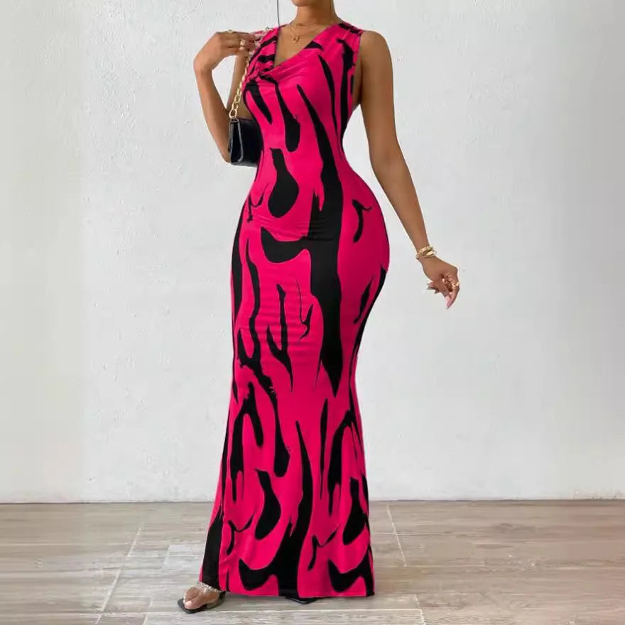 Woman wearing a sleeveless V-neck wrap midi dress with printed pattern, slim fit, ankle-length – elegant summer office style