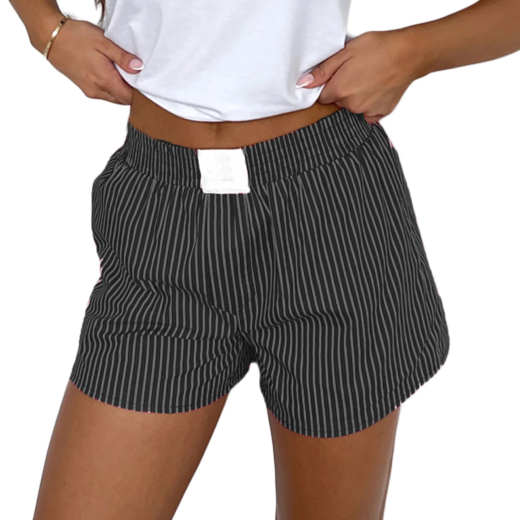 Loose High-Waist Casual Shorts made from cotton and polyester broadcloth with an elastic waist and solid pattern, perfect for summer casual wear.