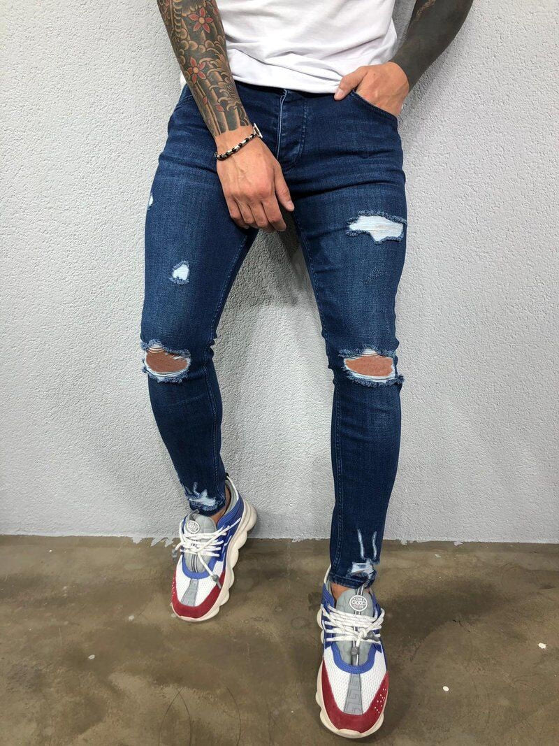 Men's Fashion Street Style Ripped Skinny Jeans with stonewashed and distressed details. Perfect for spring and autumn street style.