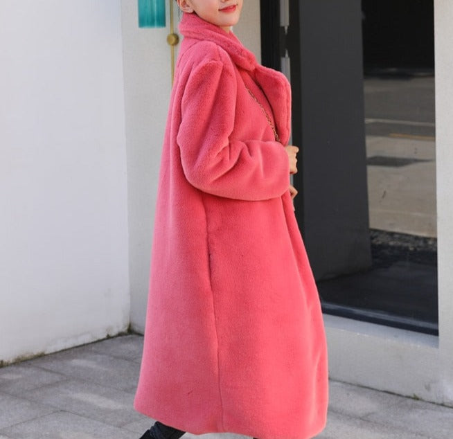 Stylish and warm fur coat with rabbit fur and faux fur for cozy winter wear.