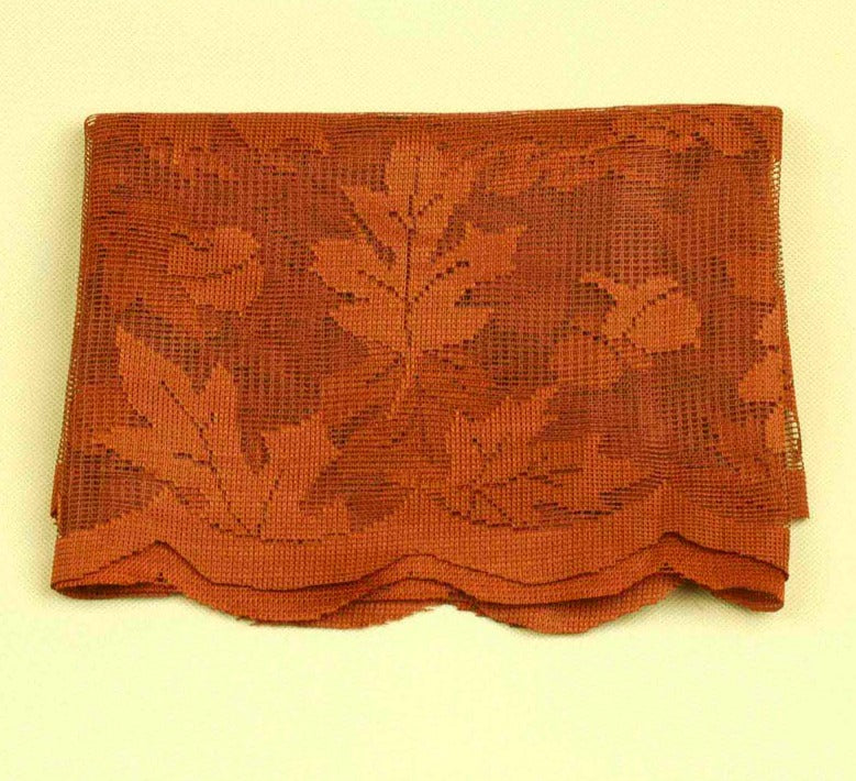 Maple Leaf Lace Table Decor, a stunning centerpiece for Thanksgiving, featuring intricate lace design inspired by autumn leaves.