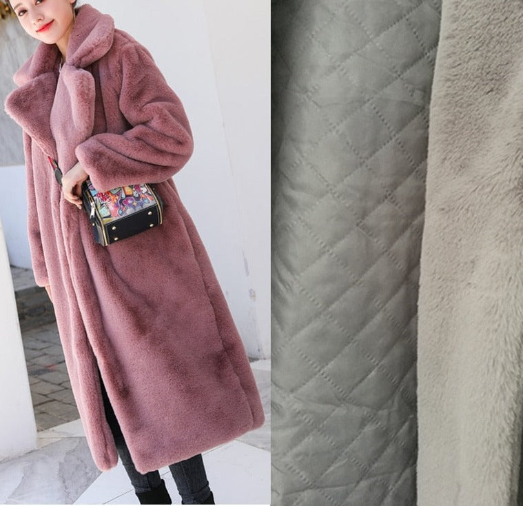 Stylish and warm fur coat with rabbit fur and faux fur for cozy winter wear.