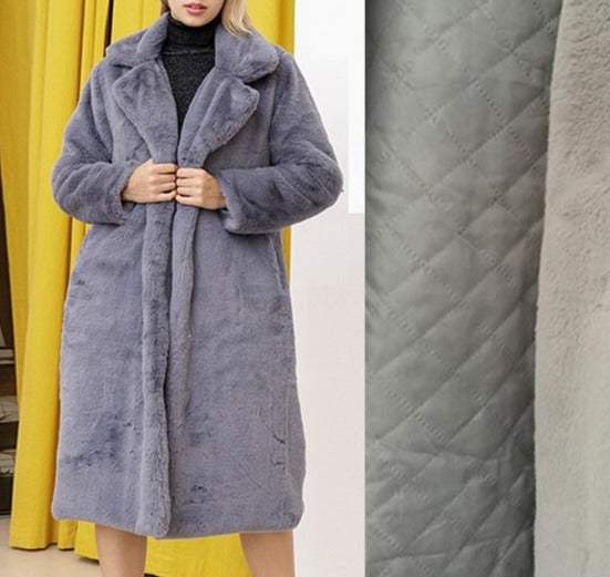 Stylish and warm fur coat with rabbit fur and faux fur for cozy winter wear.