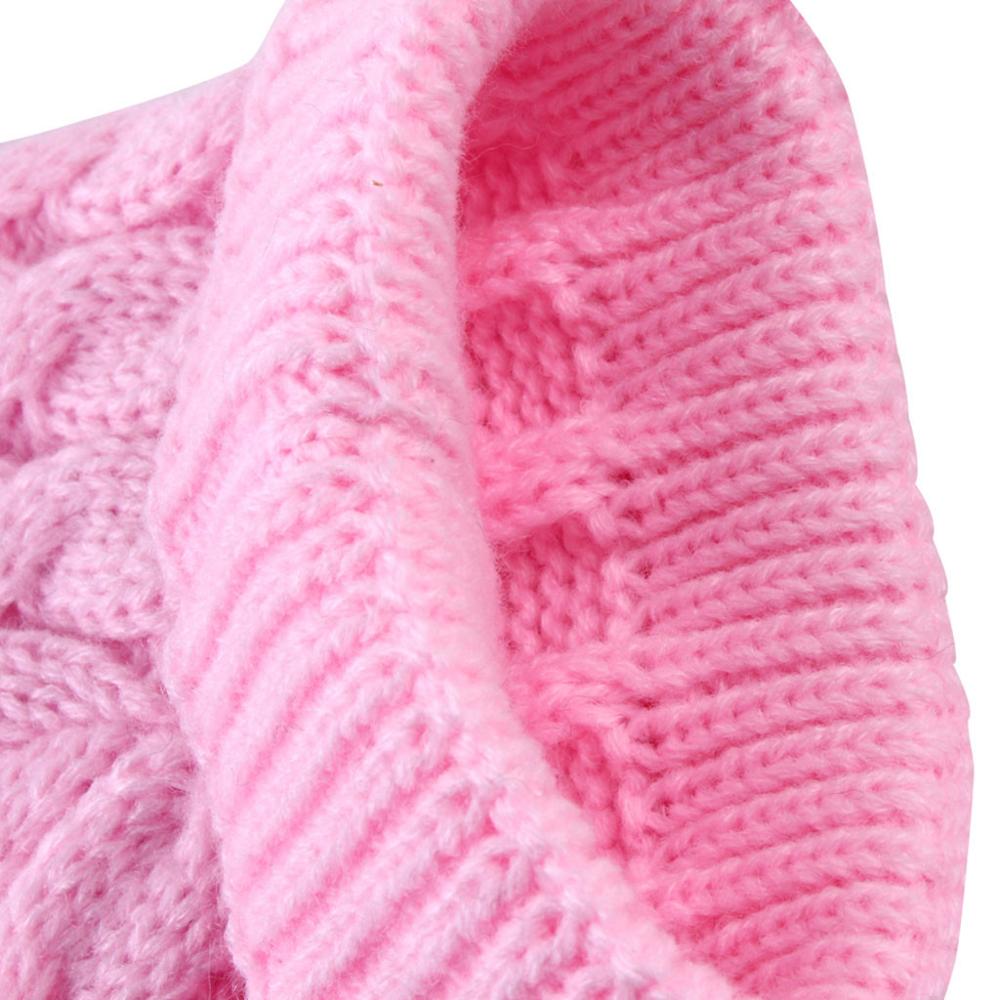Image of Knitted Pet Sweaters - Cozy wool material, available in different colors and sizes. Keep your pets warm and stylish with these adorable knitted sweaters.