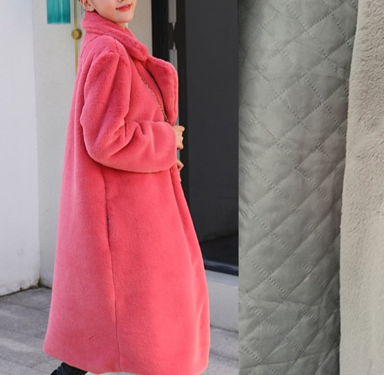 Stylish and warm fur coat with rabbit fur and faux fur for cozy winter wear.