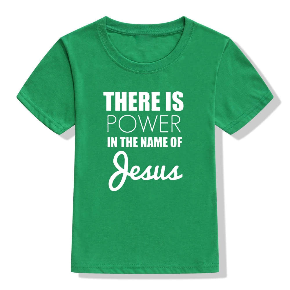 Image of True Radiant Treasures' There Is Power In The Name of Jesus Kid's T-Shirt made from 100% polyester. The comfortable and durable t-shirt is perfect for boys and girls alike, with a round neck and short sleeves. Let your child show their religious pride in style with this stylish t-shirt.