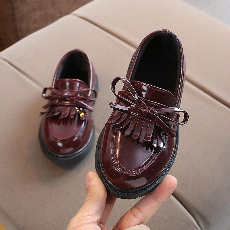 Durable leather school shoes for girls, perfect for everyday wear.