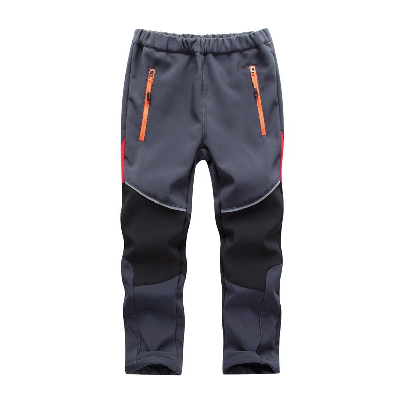 Trendy and comfortable Warm Pants for boys, ideal for various activities. Side pockets for convenience. Available in different colors and sizes. True-to-size fit for easy selection.