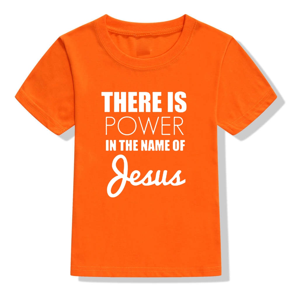 Image of True Radiant Treasures' There Is Power In The Name of Jesus Kid's T-Shirt made from 100% polyester. The comfortable and durable t-shirt is perfect for boys and girls alike, with a round neck and short sleeves. Let your child show their religious pride in style with this stylish t-shirt.