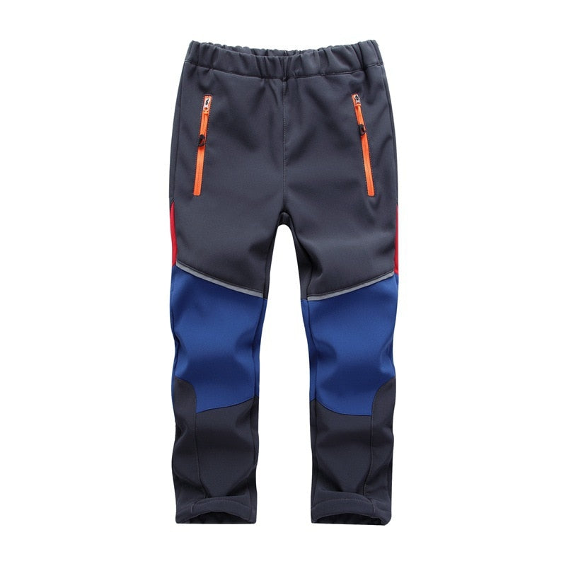 Trendy and comfortable Warm Pants for boys, ideal for various activities. Side pockets for convenience. Available in different colors and sizes. True-to-size fit for easy selection.