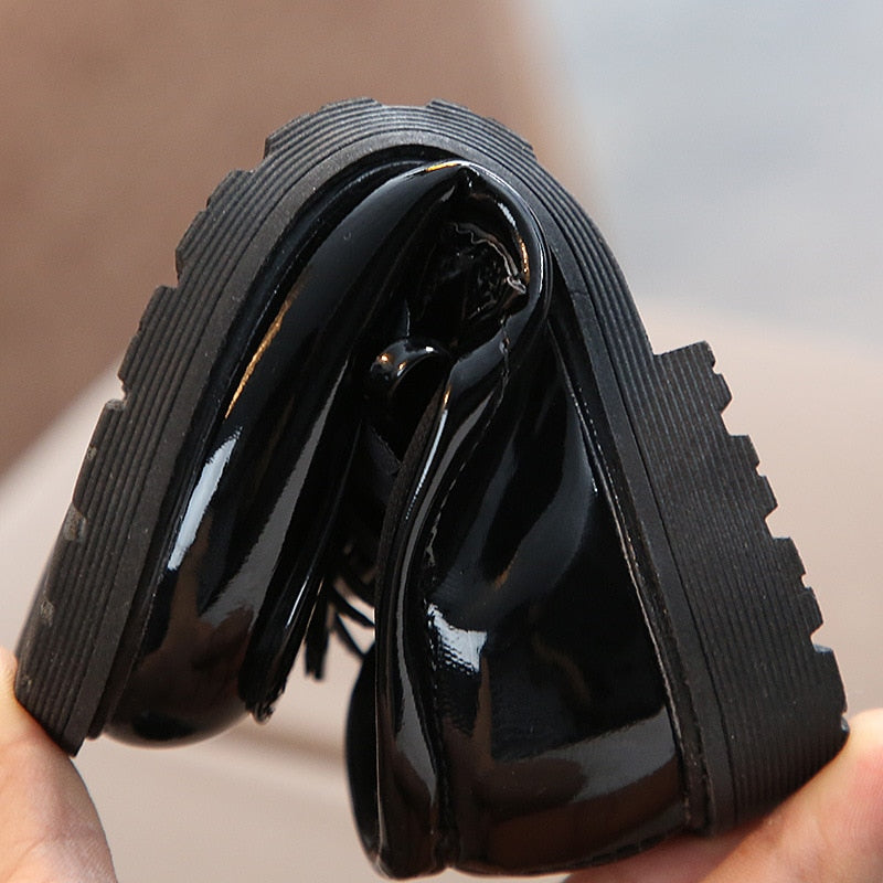 Durable leather school shoes for girls, perfect for everyday wear.