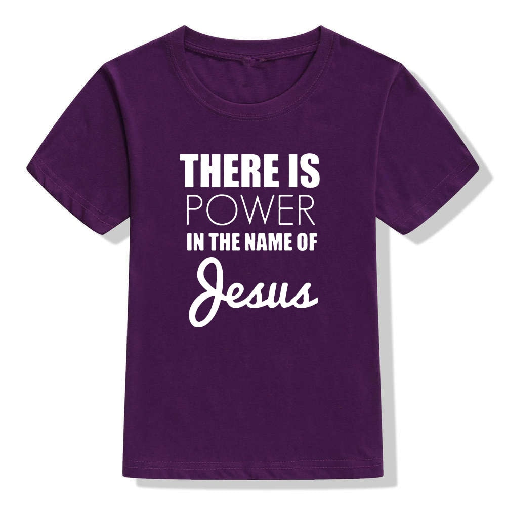 Image of True Radiant Treasures' There Is Power In The Name of Jesus Kid's T-Shirt made from 100% polyester. The comfortable and durable t-shirt is perfect for boys and girls alike, with a round neck and short sleeves. Let your child show their religious pride in style with this stylish t-shirt.