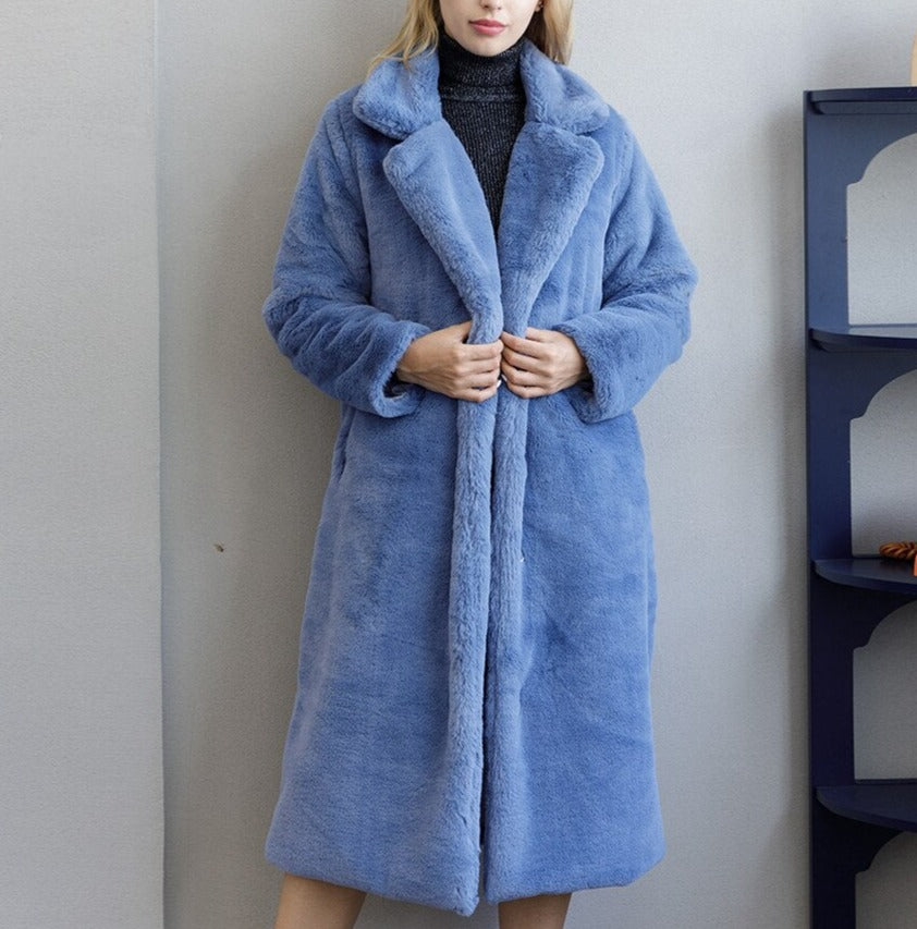 Stylish and warm fur coat with rabbit fur and faux fur for cozy winter wear.