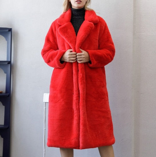Stylish and warm fur coat with rabbit fur and faux fur for cozy winter wear.