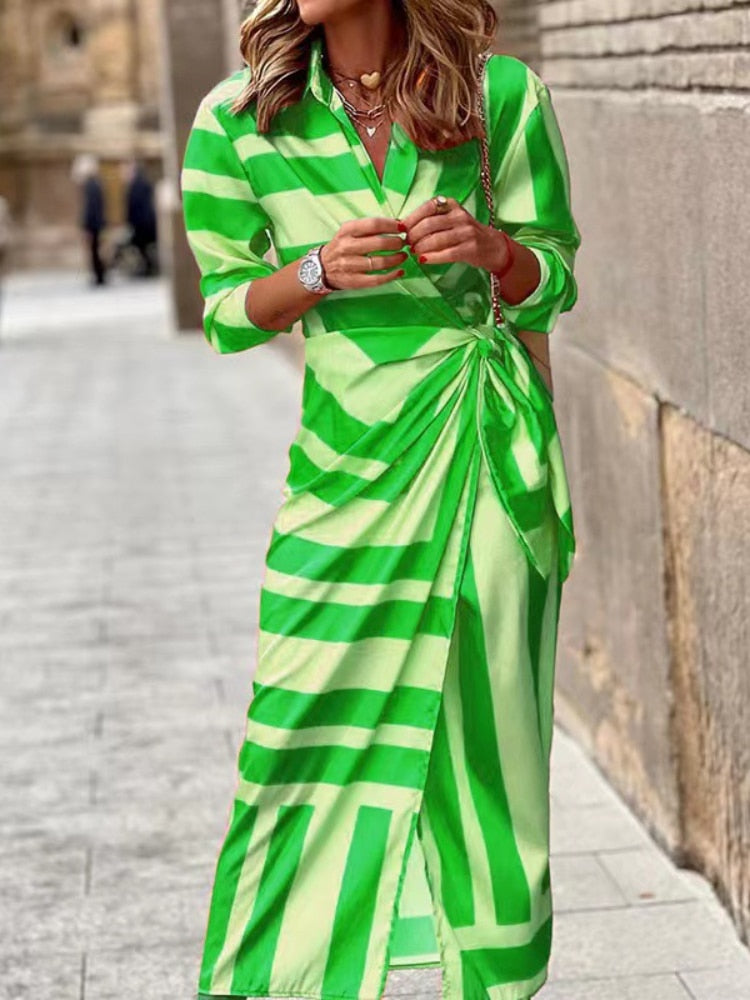 Stunning spring v-neck dress with ankle-length design, vibrant colors, and comfortable polyester-acetate fabric for a versatile and fashionable look.