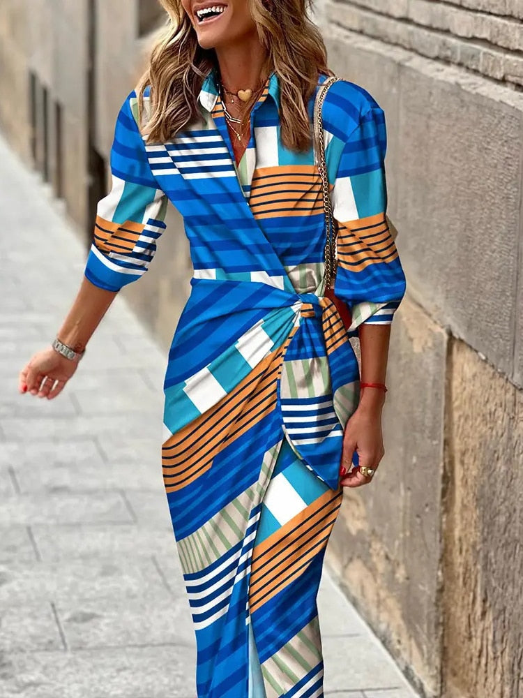 Stunning spring v-neck dress with ankle-length design, vibrant colors, and comfortable polyester-acetate fabric for a versatile and fashionable look.