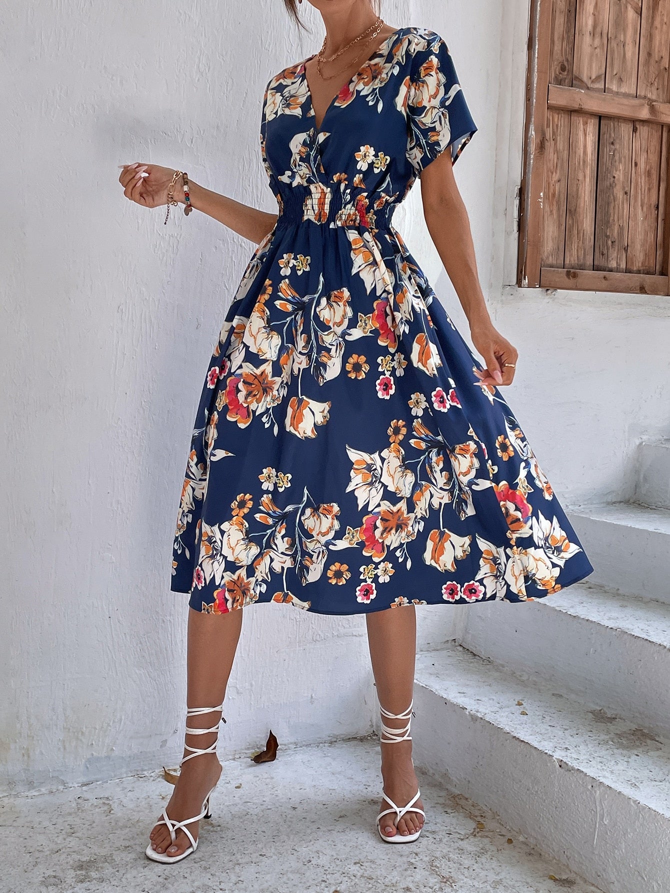 Floral v-neck chiffon dress - a perfect addition to your wardrobe with its bright floral print and A-line silhouette.