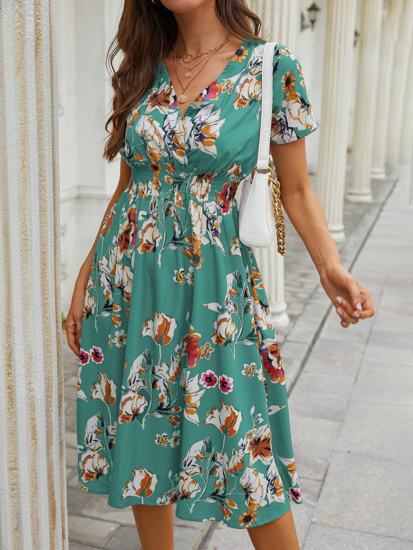 Floral v-neck chiffon dress - a perfect addition to your wardrobe with its bright floral print and A-line silhouette.