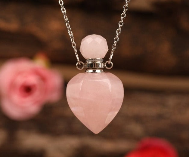 Heart-shaped Gold Silvery Necklace with treated rose quartz stone - A versatile and elegant accessory for women, promoting emotional bonding and desire.