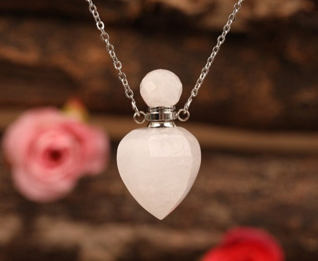 Heart-shaped Gold Silvery Necklace with treated rose quartz stone - A versatile and elegant accessory for women, promoting emotional bonding and desire.