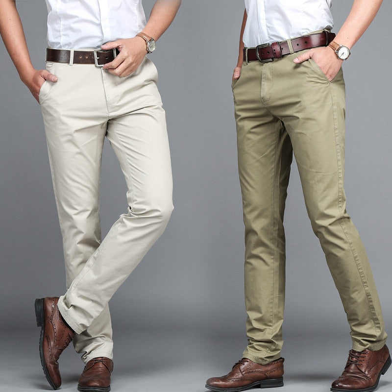 A pair of stylish trousers with a unique shirt gripper feature, designed to keep your shirt in place. Versatile for any occasion, featuring a stretch waistband for comfort.