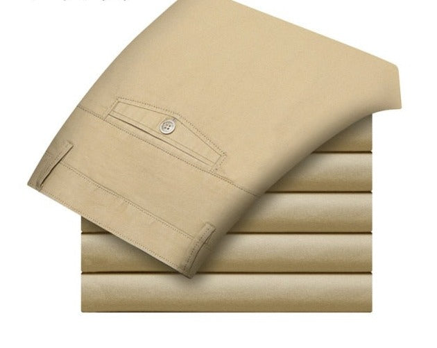 A pair of stylish trousers with a unique shirt gripper feature, designed to keep your shirt in place. Versatile for any occasion, featuring a stretch waistband for comfort.