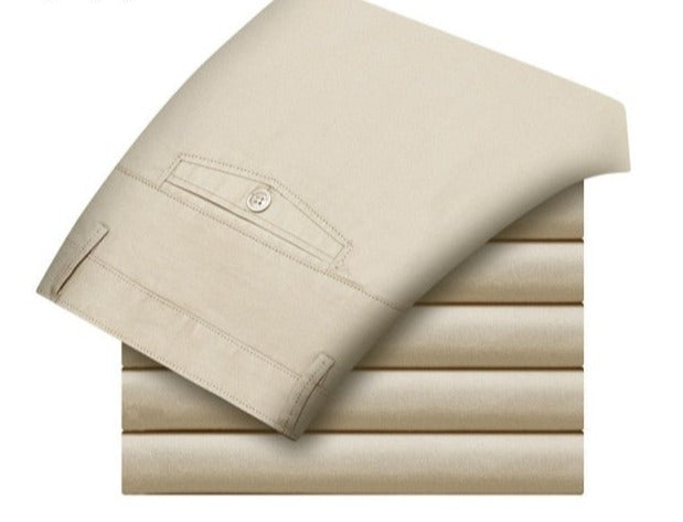 A pair of stylish trousers with a unique shirt gripper feature, designed to keep your shirt in place. Versatile for any occasion, featuring a stretch waistband for comfort.
