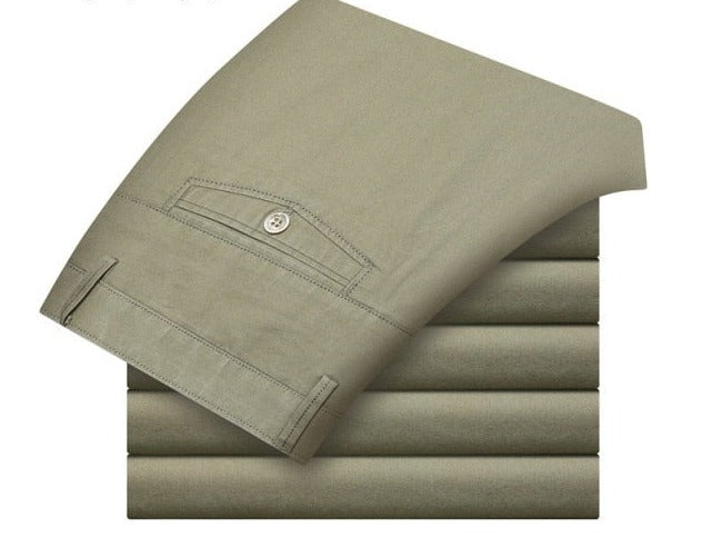 A pair of stylish trousers with a unique shirt gripper feature, designed to keep your shirt in place. Versatile for any occasion, featuring a stretch waistband for comfort.