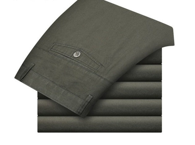 A pair of stylish trousers with a unique shirt gripper feature, designed to keep your shirt in place. Versatile for any occasion, featuring a stretch waistband for comfort.