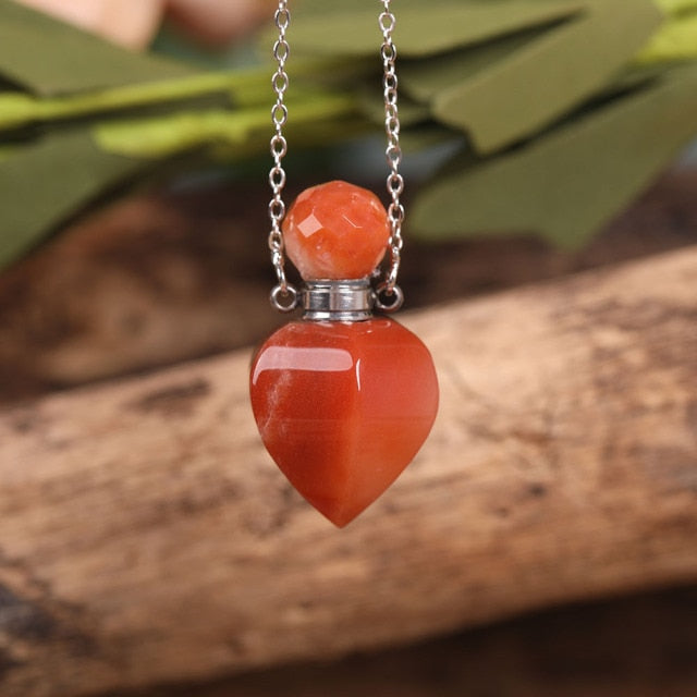 Heart-shaped Gold Silvery Necklace with treated rose quartz stone - A versatile and elegant accessory for women, promoting emotional bonding and desire.