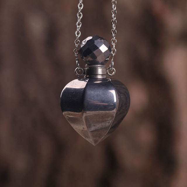Heart-shaped Gold Silvery Necklace with treated rose quartz stone - A versatile and elegant accessory for women, promoting emotional bonding and desire.