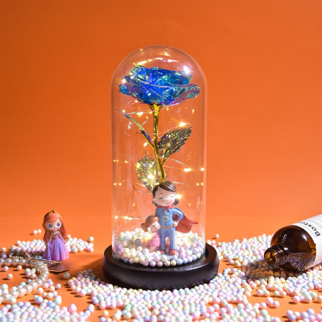 Artificial galaxy rose flowers in glass dome with LED lighting on black wood base, perfect for home decor or romantic gift for Valentine's Day, weddings. or any special occasion.