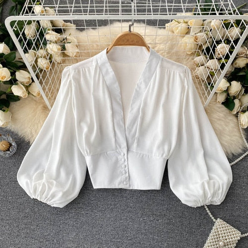 French Chic Casual Blouse made with high-quality materials, this blouse features a classic fit that's perfect for any casual occasion.